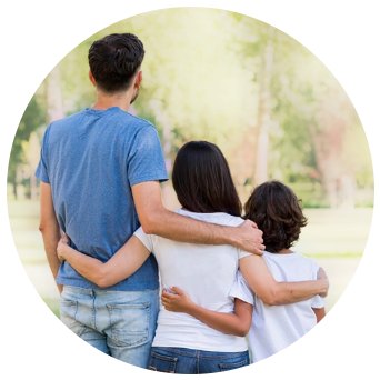 Family embracing outdoors